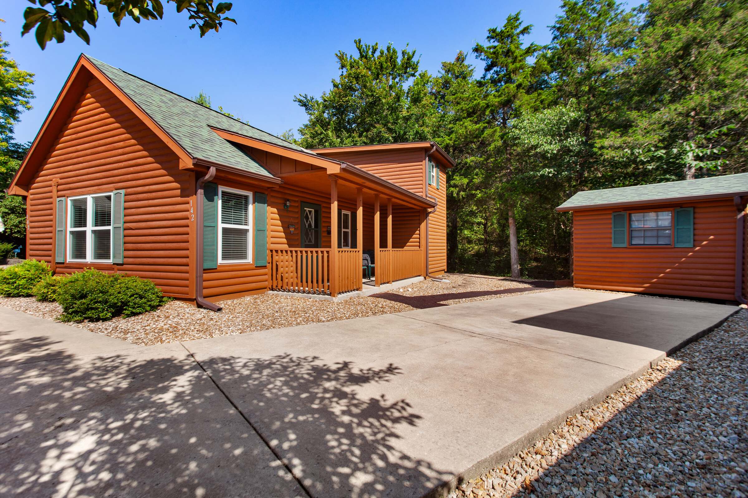 Front exterior of a Branson cabin rental in evening light