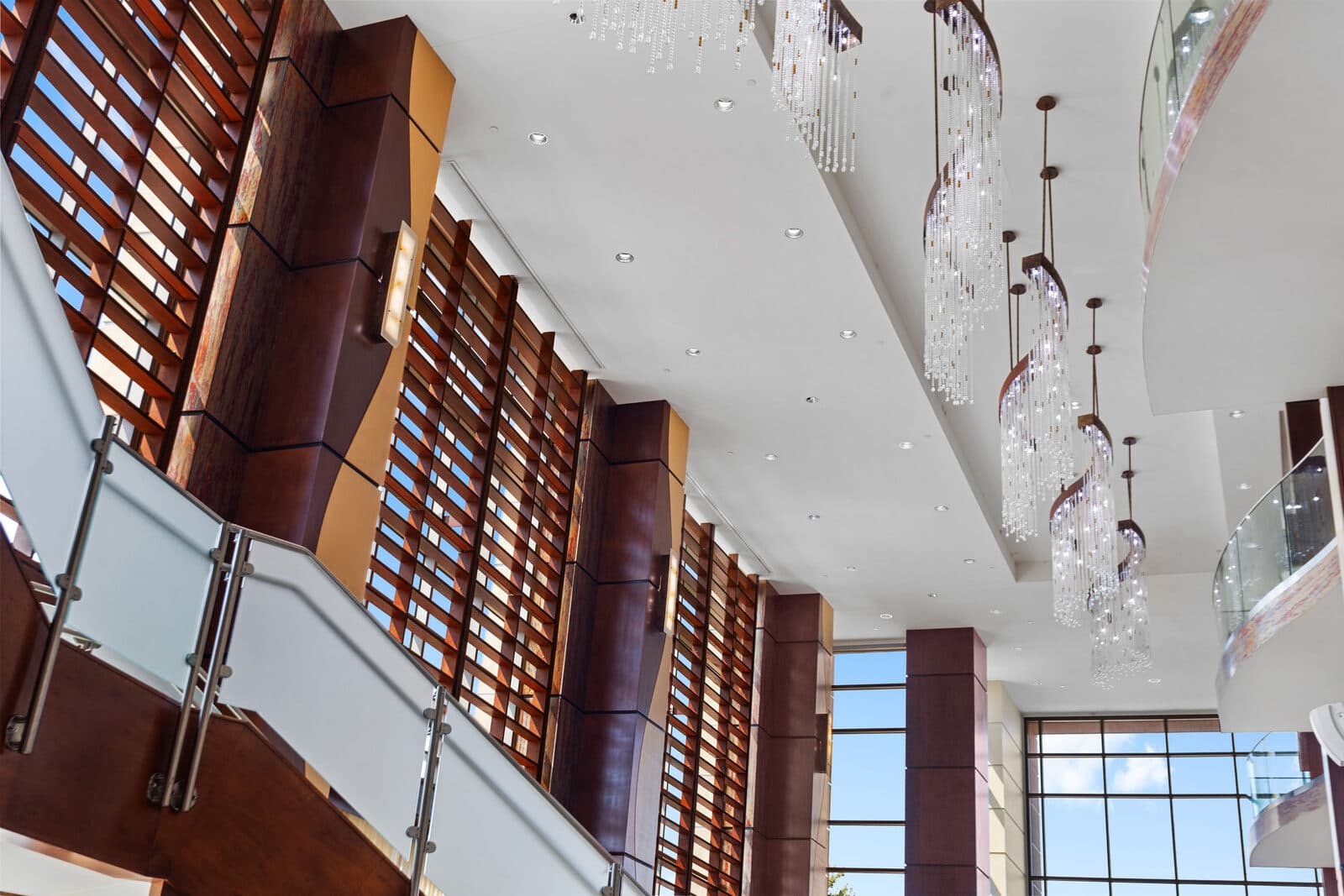 Hotel lobby atrium with open stairs and seating