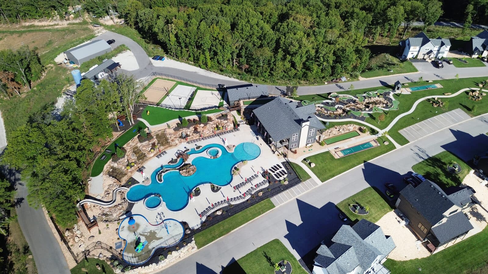 Aerial photo of a resort pool complex and grounds